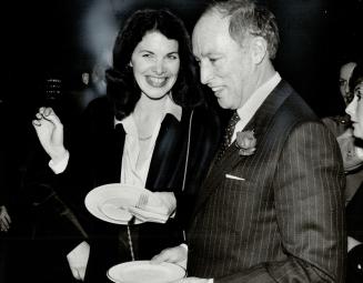 Fine time: Prime Minister Pierre Trudeau shares a joke with Sherry Lansing, 20th Century-Fox's unmarried production boss, at a reception following the premiere of Quest for Fire in Toronto