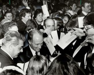 Trudeau mobbed: Eager autograph hunters mob Prime Minister Pierre Trudeau at Exhibition Place last night after he gave a rousing 85-minute speech to 4,000 at a Liberal party fund-raising dinner