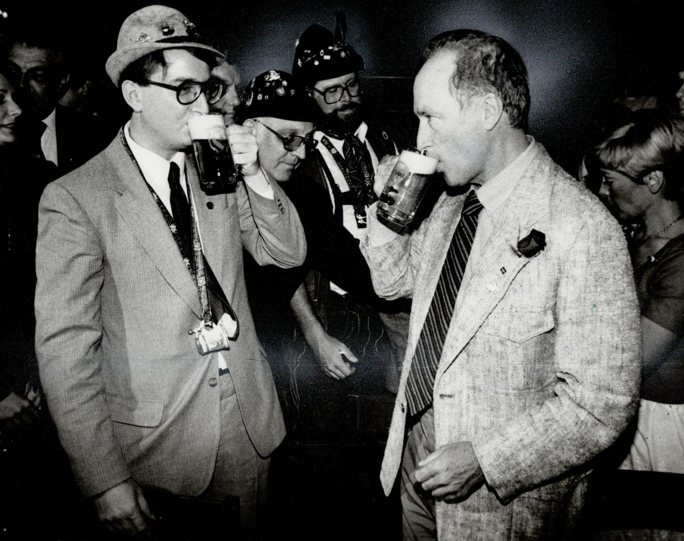 A more relaxed PM: While touring Western Ontario, Prime Minister said nice things about Brian Mulroney, was relaxed with Strathroy townspeople and, above, quaffed a stein at Kitchener's Oktoberfest