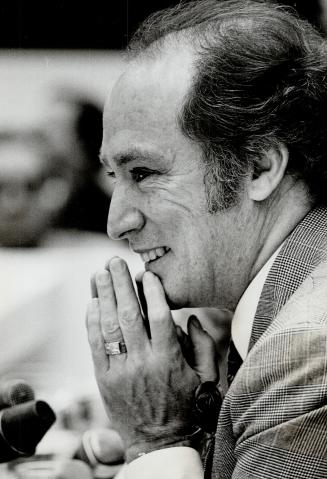 Brussels: Canadian Prime Minister Pierre Trudeau listens to newsmen's questions during a 10/25 press conference at the International Press Center at the end of his 2 day official visit to Belgium