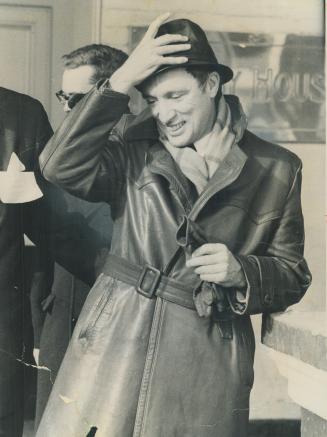 Creating the Trudeau look, the man of the moment in his green leather belted coat and the green leather hat which had all the reporters commenting. An outfit to go with his Mercedes 300SL
