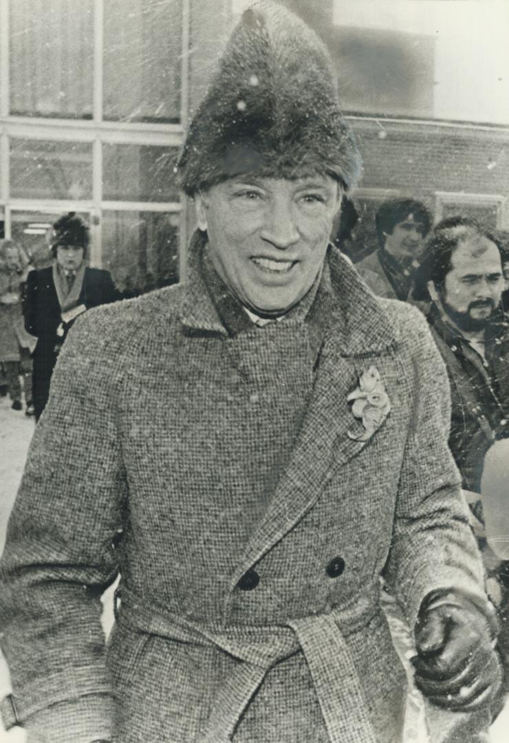 Ready to govern: Prime minister-elect Pierre Trudeau sports an Alberta lily in his lapel, replacing his one-famous rose, as he leaves a 55-minue meeting with Governor-General Ed Schreyer in Ottawa