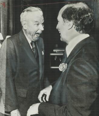 A moments bantering was exchanged last night between former Prime Minister John Diefenbaker and Prime Minister Pierre Trudeau during reception at residence of Canadian High Commissioner Paul Martin