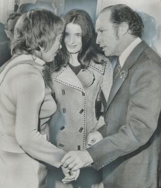 Legislative Assistant Joyce Fairbairn consoles Prime Minister Pierre Trudeau and his wife, Margaret, as they leave campaign headquarters atop the Skyl(...)