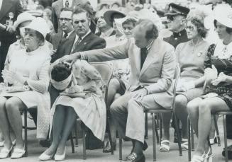 Prime Minister Pierre comforted his wife, Margaret, when she felt ill and slumped forward in her seat during royal visit ceremonies in Charlottetown y(...)