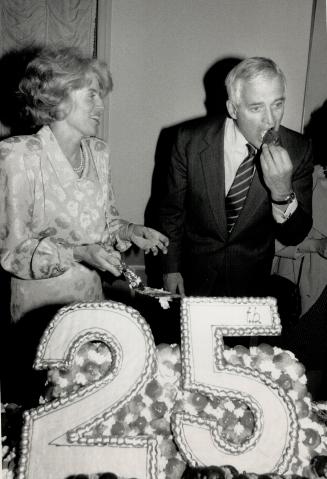 Turners celebrate: Liberal leader John Turner and his wife, Geills, cut a giant cake prepared for them by Villa Colombo in North York during a party celebrating their 25th wedding anniversary