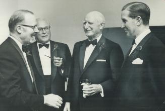 Lord Tweedsmuir (right), British peer connected with major Canadian companies told annual dinner of the Toronto Board of Trade last night that Canada (...)