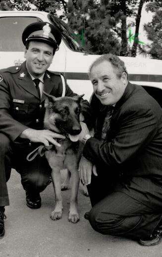 Canine cop: Handler Constable Frank Auld and Newmarket Mayor Ray Twinney, vice-chairman of the York Region Police Commission, show off Lani, one of four new police dogs