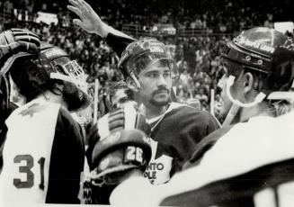 Rick Vaive's Expression tells the whole story as leafs gather after final