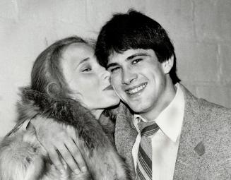 Congratulations: Rightwinger Rick Vaive who set Maple Leaf scoring record last night at the Gardens, receives kiss from his wife, Joyce, after the game, won by Toronto over Chicago Blacks Hawks, 8-5