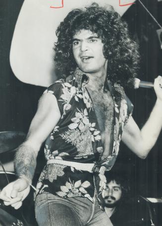 Pampered artist, singer Gino Vannelli, works up a sweat at the Colonial Tavern, where he's just finished drawing 7,000 fans during a two-week run