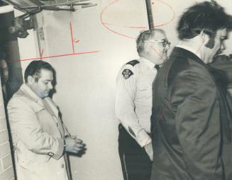 Paolo Violi in Handcuffs. Police interrupted his dinner