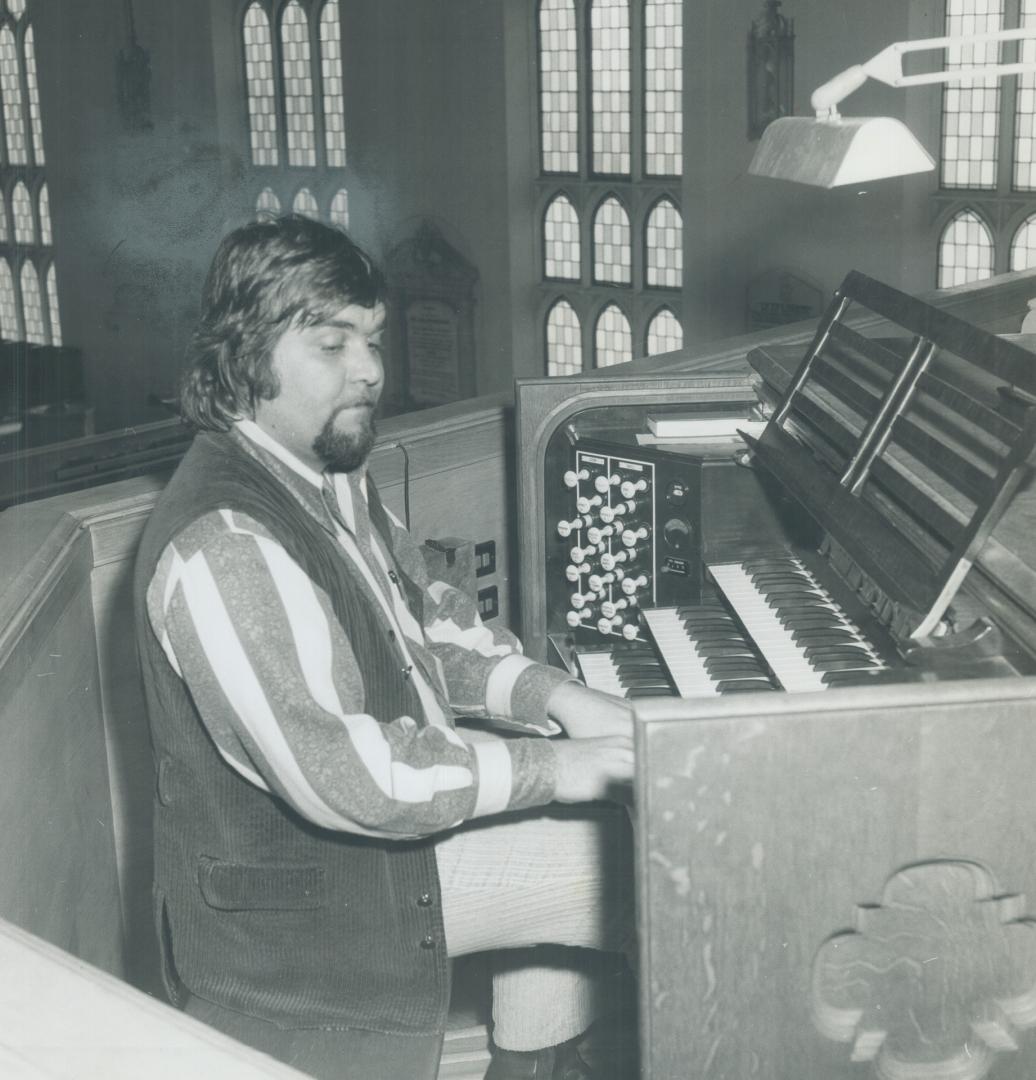 Mod organist David Walden, 29. He's determind to get things swinging for Christ