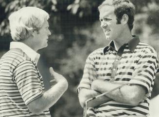 Out: Jack Ncklaus (left) chats with Tom Weiskopf, the defending champion, during a break in play at the Canadian Open golf tournament in Windsor