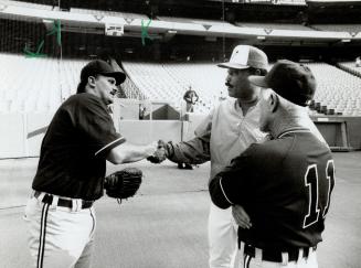 Cordial Welcome: With Detroit manager Sparky Anderson looking on ex-Jay David Wells, left, is greeted yesterday by Cito Gaston