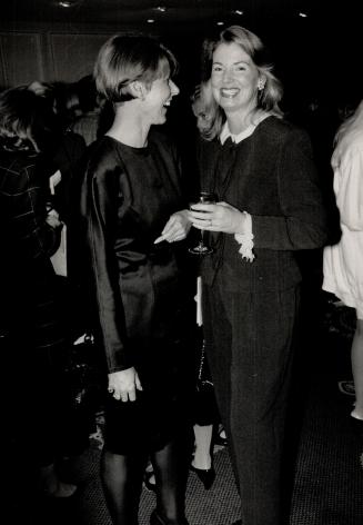 Far right, Holt Renfrew director Hilary Weston in Armani with Holt's special events co-ordinator Gwen Gibson