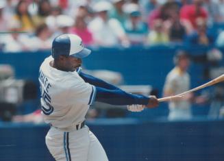 Snap! Blue Jay Devon White breaks his bat with a mighty swing against the White Sox yesterday