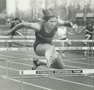 White hot. Brampton's Julie White was a big star at the Peel high school track and field championships yesterday at Etobicoke Centennial Stadium