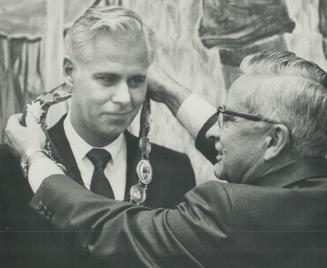 Robert White, left, is filling in or the man he followed as mayor of Scarborough in 1969, Metro Chairman Albert Campbell, recovering from surgery