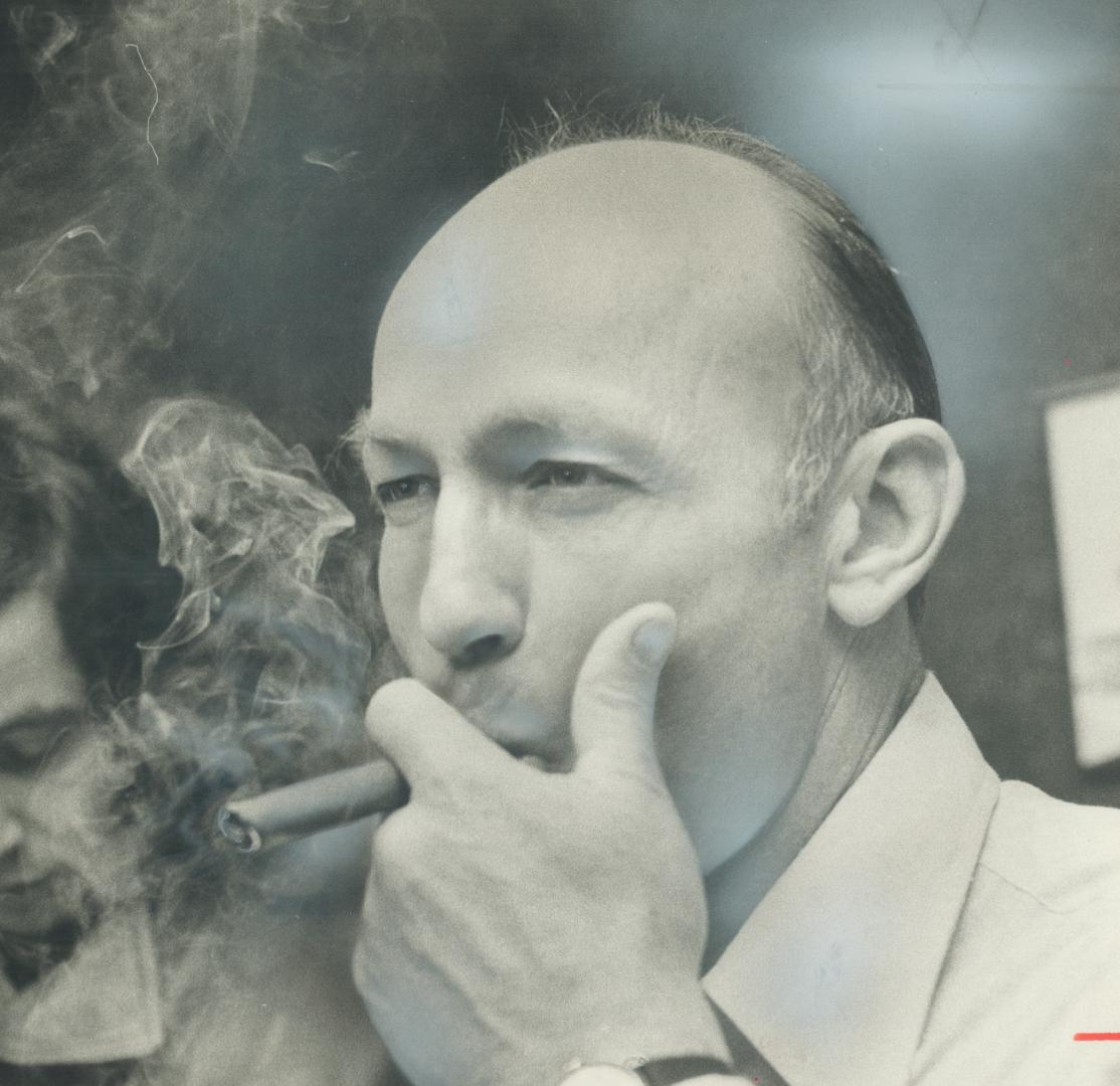 Happy Jerry Williams. Savoring a plump cigar