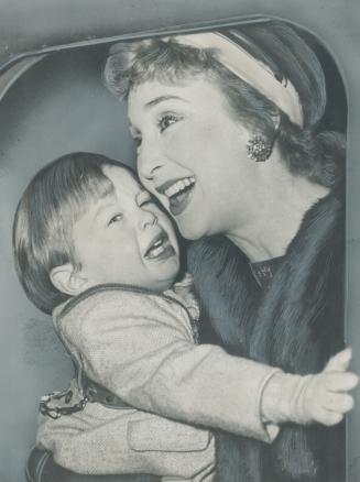 Comedian antics of actress Googie Withers, which have kept many an audience in stitches, don't seem to be working too well with her son, Nicholas, two(...)