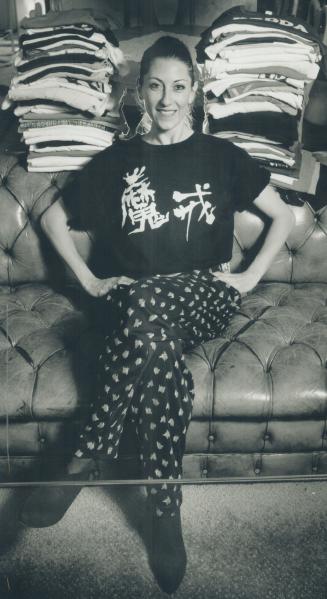 Different drummer: Ballerina Gizella Witkowsky shows off some of the T-shirts she's collected during her travels