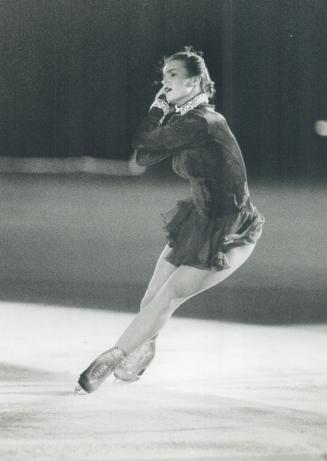 Precision Grace: German skater Katarina Witt cuts across the ice at a tribute to the late Rob McCall