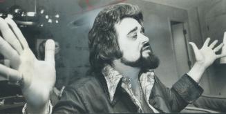 Celebrated Dis Jockey Wolfman Jack (real name Bob Smith from Brooklyn) extols working conditions in Toronto where he has joined with the CBC to produc(...)
