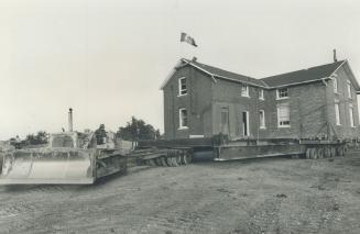 The big move. The 400-ton brick home of James Shaver Woodsworth - one of the founders of the Cooperative Commonwealth Federation - has been moved to a(...)