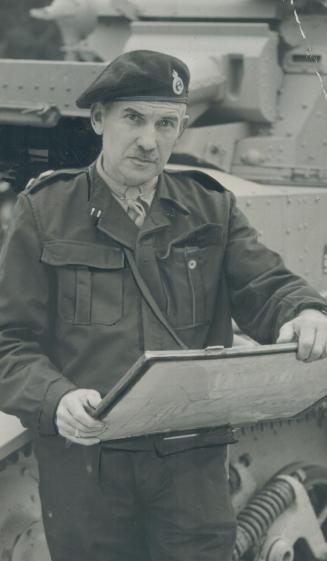 Colonel Worthington maps out the route for his fleet of land battleships