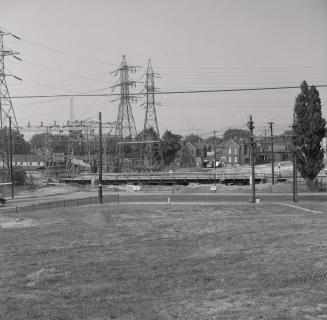 Davenport Road, looking southwest from Earlscourt Park, Caledonia Park Road at right, showing construction of subway under C.N.R tracks. Toronto