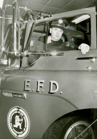 Amalgamation of fire departments is opposed by Etobicoke Deputy Chief J. Ross Bissell, above