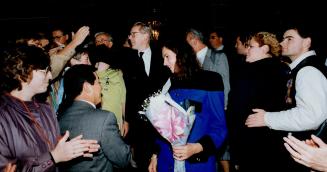 Happy throng: Premier Bob Rae, preceded by wife Arlene Perly Rae, greets well-wishers at Legislature last night