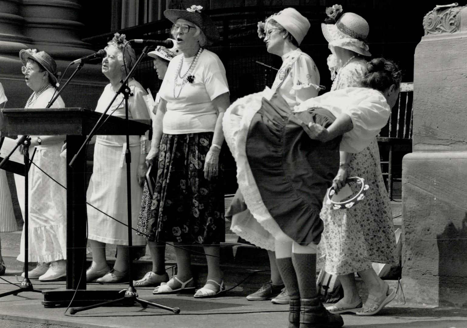 They're raging: Members of the Raging Grannies perform at a Queen's Park rally yesterday before a march to Ontario Hydro headquarters