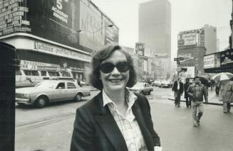 Kate Reid takes in the excitement of New York's Times Square, looking Broadway-born and laughing about her good fortune