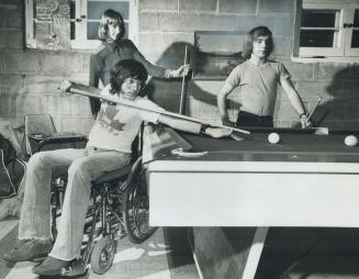 Shooting pool in the basement of his Scarborough home, 18-year-old Edgar Reiprich says an operation for paralysis he underwent in the Soviet Union has(...)