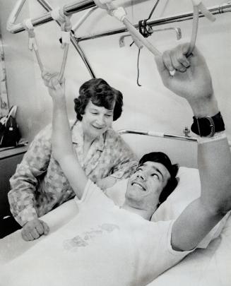 Paralyzed from the chest down by a motorcycle accident in 1971, 17-year-old Edgar Reiprich and his mother, Mrs