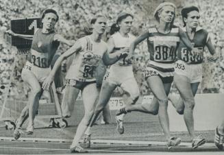 Forced to outside in semi-final of women's 1,500-metre race yesterday at Olympic Games in Munich is Ottawa's Glenda Reiser, second from left. Only 17,(...)