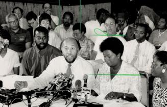 Call for action: Lawyer Charles Roach, centre, is one of founders of committee demanding civilian inquiry into shooting