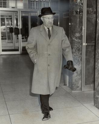 Mr. Justice Wilfrid Roach. Arriving at crime commission hearing