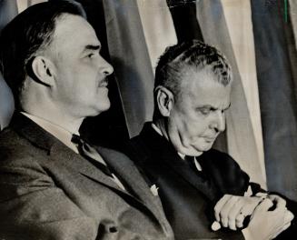 Now is the Time . .' Ontario's Premier John Robarts (left) is seen looking at the time with Prime Minister Diefenbaker at the Ontario Progressive Cons(...)