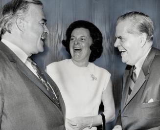 A moment of Hilarity is shared by Ontario's Premier John Robarts, Mrs