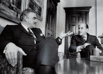 The man in charge of Ontario, Premier John Robarts, gestures as he explains stand on medicare to Star Editor in Chief Peter C. Newman during an exclus(...)