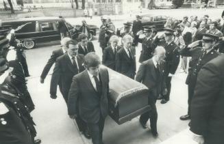The coffin of former Ontario premier John Robarts arrives Thursday at St