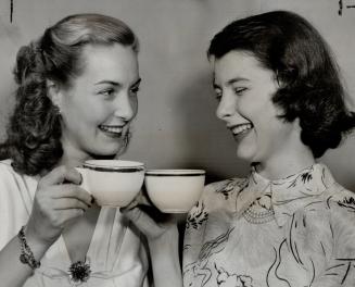 Screen queen and teen queen, Patricia Roc, left, and Toronto's Mary Cranston, 15, who won her title at the C