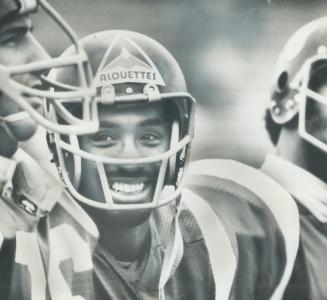 Johnny Rodgers, Montreal Alouettes' $140,000-a-year split end, smiles broadly in anticipation of tomorrow's Grey Cup football game in Vancouver agains(...)
