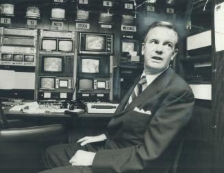 Ted Rogers, here in headquarters of his cable TV empire, seeks to take over rival Canadian Cable systems
