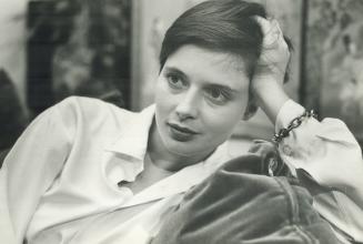 In the midst of divorcing her second husband, Isabella Rossellini blushingly admits she's seeing Misha, her charismatic co-star in White Nights