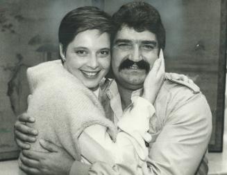 Bosom bond: Cover-girl Isabella Rossellini and Metro construction worker Giuseppe Zeppieri were wet nursed together by his mother and met yesterday for the first time in 20 years
