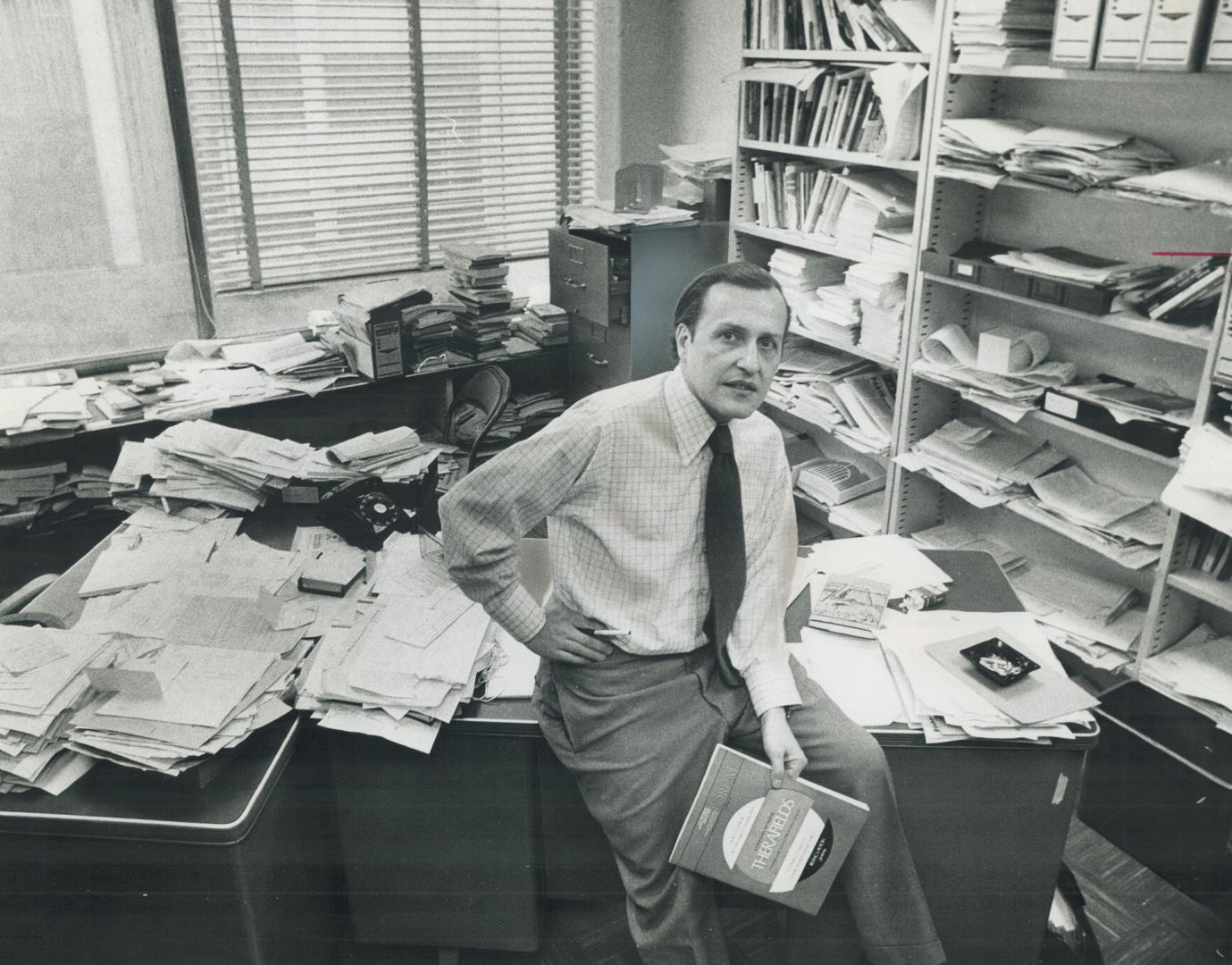 Abraham Rotstein, a founder of the Committee for an Independent Canada and author of a book on foreign ownership, does most of his work in a paper-str(...)